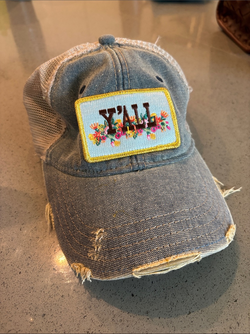 Denim Distressed Trucker Hat with gold Floral Patch